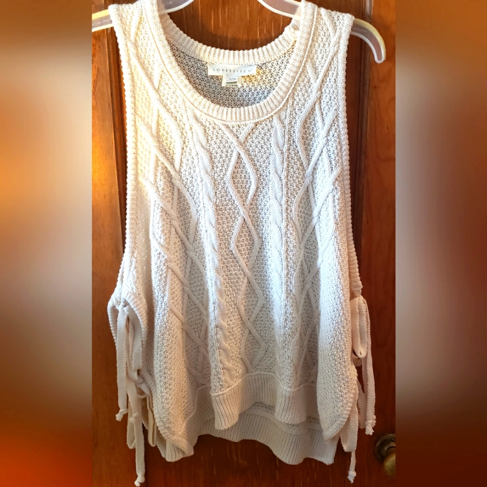 s/m love stich sweater  ..really good condition cream colored